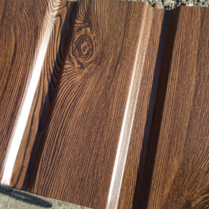 Фасад из профнастила с 10 под дерево орех 1170 мм ширина листа